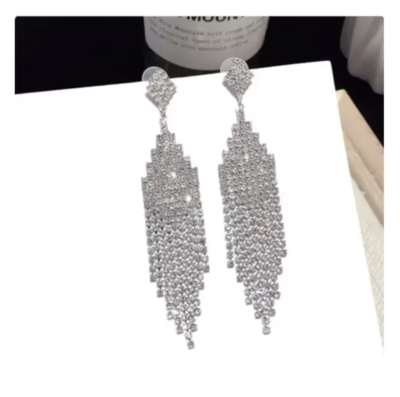 Earrings for women crystal oorbellen hangers statement chain pendientes largos ear circle tassel trendy geometric Euro-American